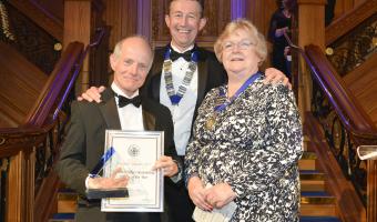 HCA chair Phil Shelley (centre) with winner Chris Lay (left) and Fionnuala Cook, HCA president (right)